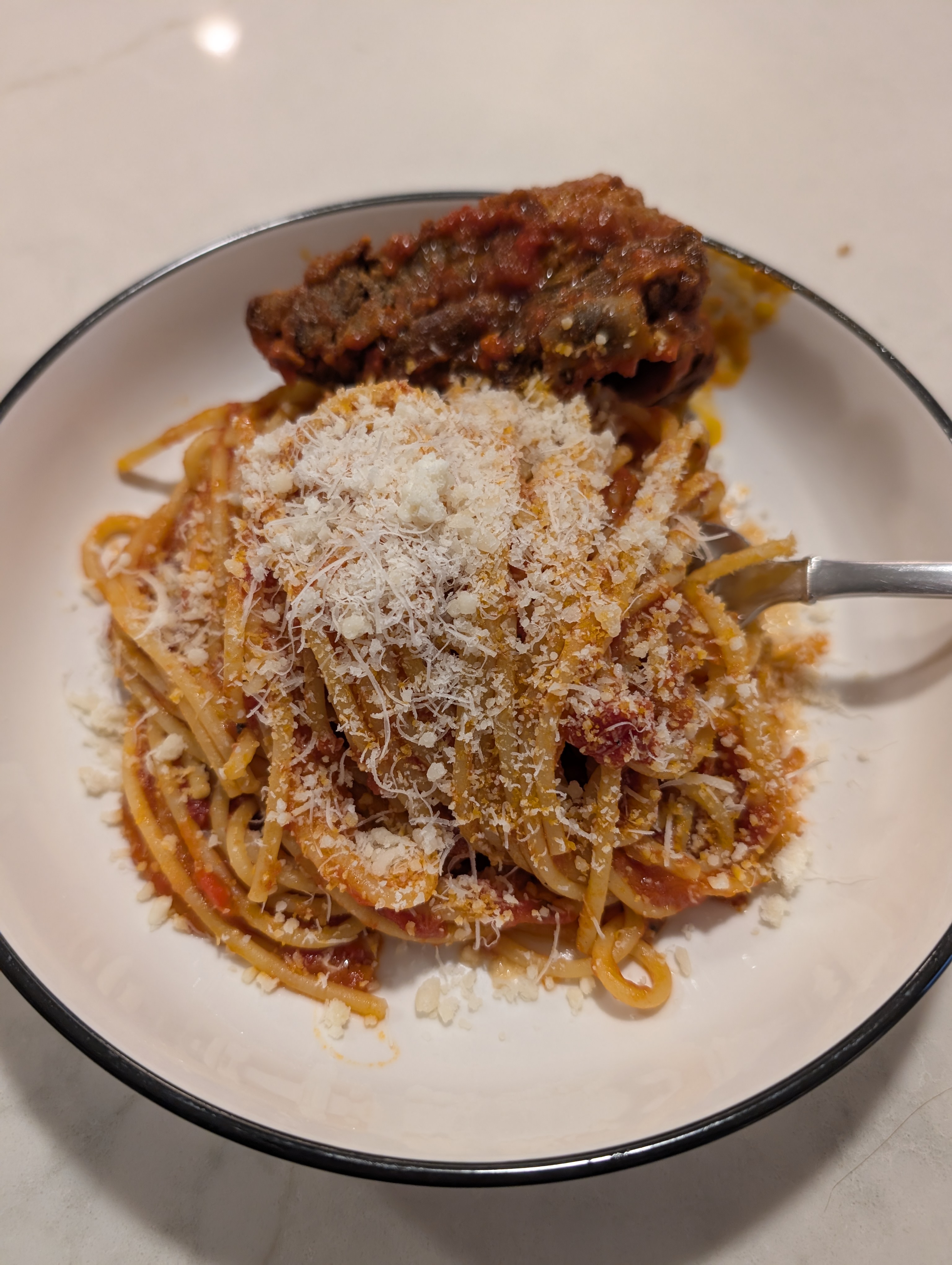 Spaghetti and meatballs with parmesan